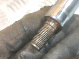 Амортизатор передний левый Mazda 323 1994-1998