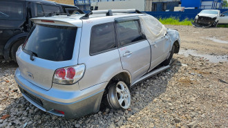 В разборе Mitsubishi Outlander CU