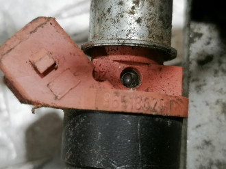 Форсунка двигателя Chevrolet Aveo 2005-2011