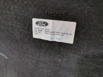 Обшивка багажника левая Ford Focus 2005-2008