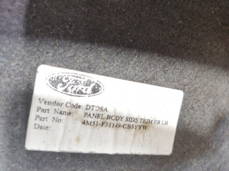 Обшивка багажника левая Ford Focus 2005-2008