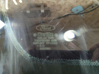 Стекло кузовное глухое заднее левое Ford Focus 1998-2005