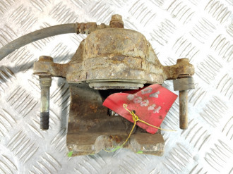 Суппорт передний левый Kia Carens 2002 2006