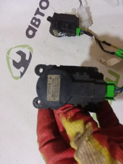 Моторчик заслонки отопителя Mitsubishi Lancer 9