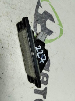 Фонарь подсветки номера Mitsubishi Lancer 7