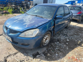 В разборе Mitsubishi Lancer 9