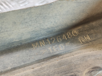 Брызговик правый задний Mitsubishi Lancer 9