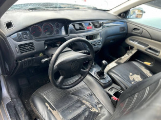 В разборе Mitsubishi Lancer 9