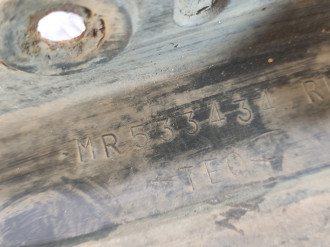 Брызговик правый передний Mitsubishi Lancer 9