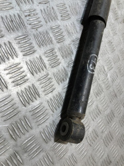 Амортизатор задний правый Nissan Navara d40