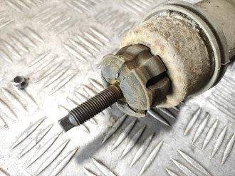 Амортизатор задний левый Nissan Micra K11