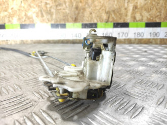 Замок двери передней левой Nissan Micra K11