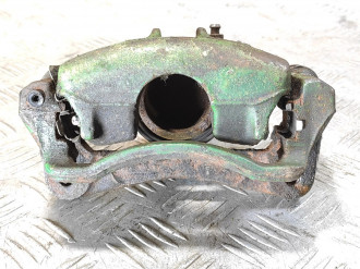 Суппорт передний левый Nissan Micra K11