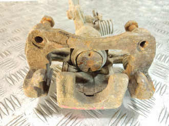 Суппорт задний левый Nissan Almera N16