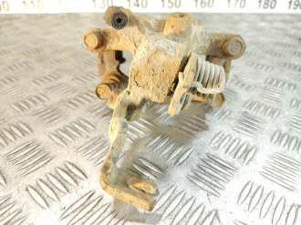 Суппорт задний левый Nissan Almera N16