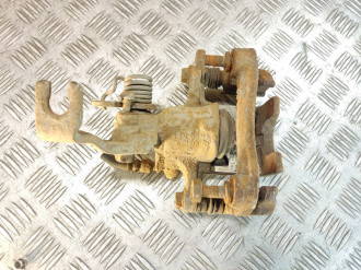 Суппорт задний левый Nissan Almera N16