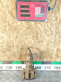 Суппорт задний левый Nissan Almera N16