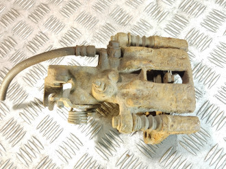 Суппорт задний левый Nissan Almera N16