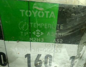 Стекло двери передней левой Toyota Corolla AE110