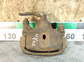 Суппорт передний правый Toyota Corolla e10