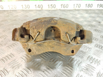 Суппорт передний левый Toyota Avensis 1 1997-2003